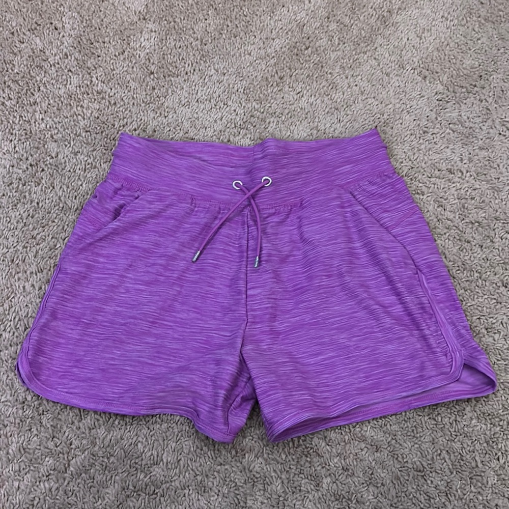 Kids purple athletic shorts.